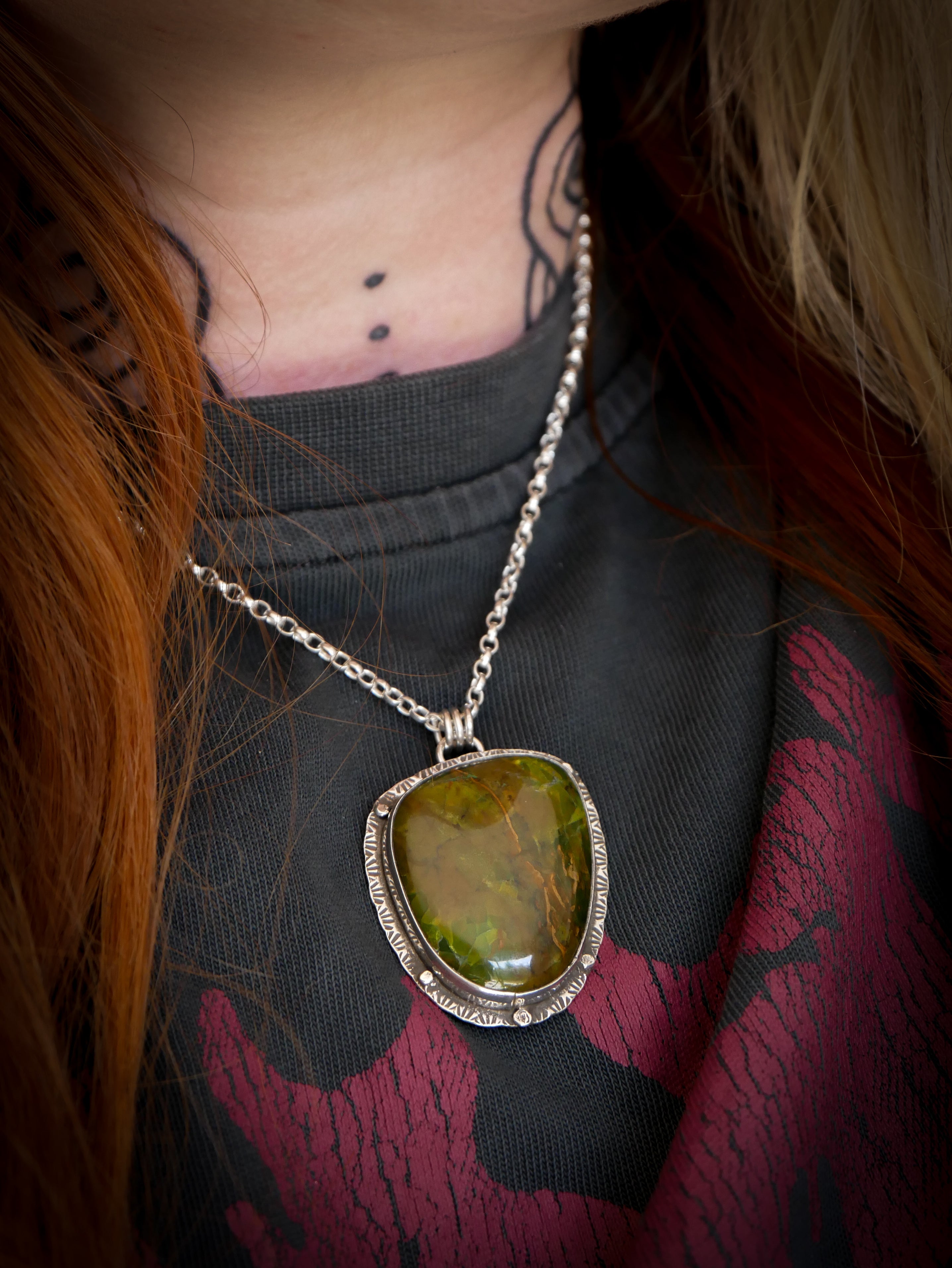 The Awakening of the Faun - Green opal and silver medallion, faun on the back