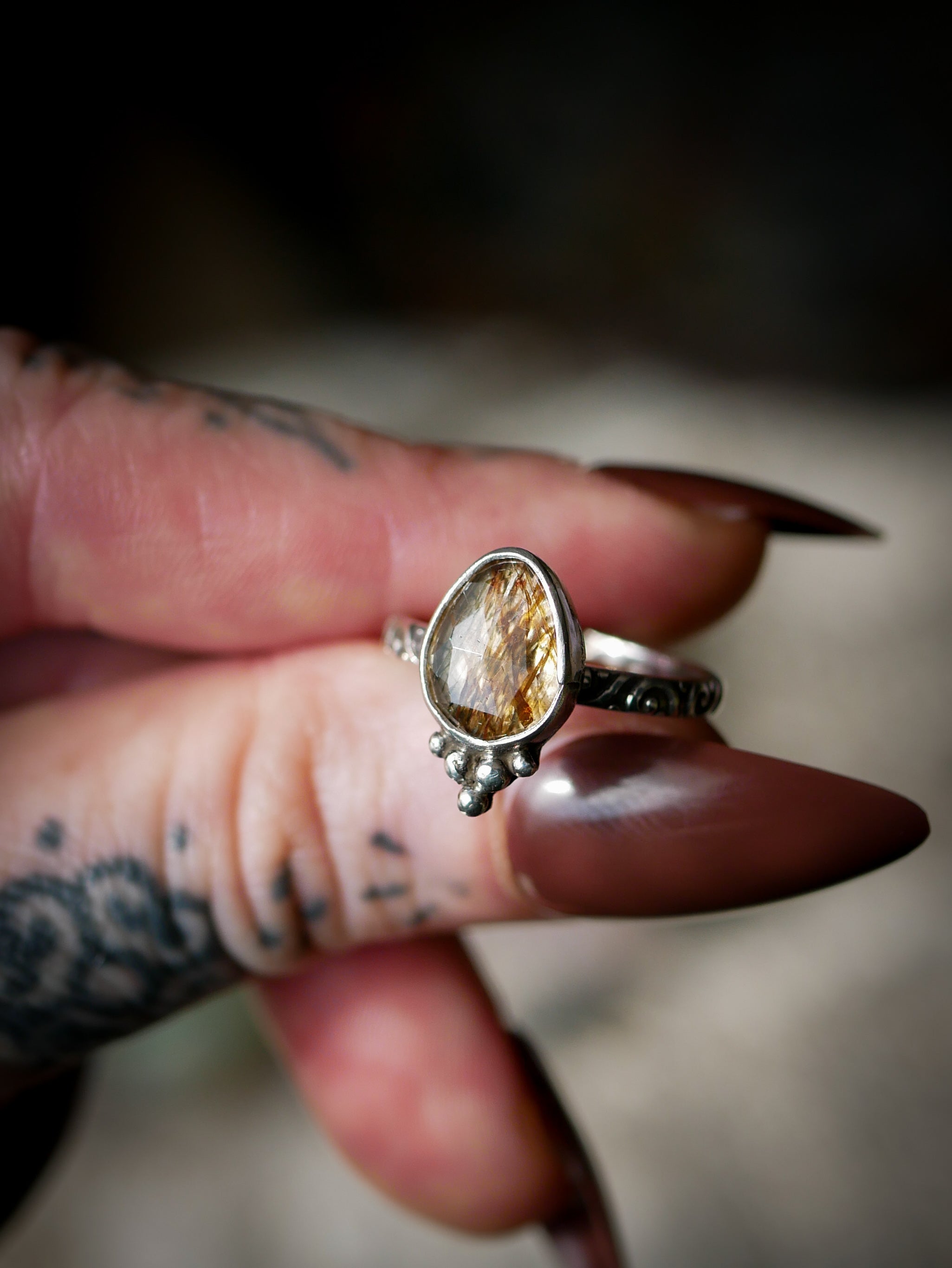 Vasudhārā - Faceted Golden Rutilated Quartz and Silver Ring