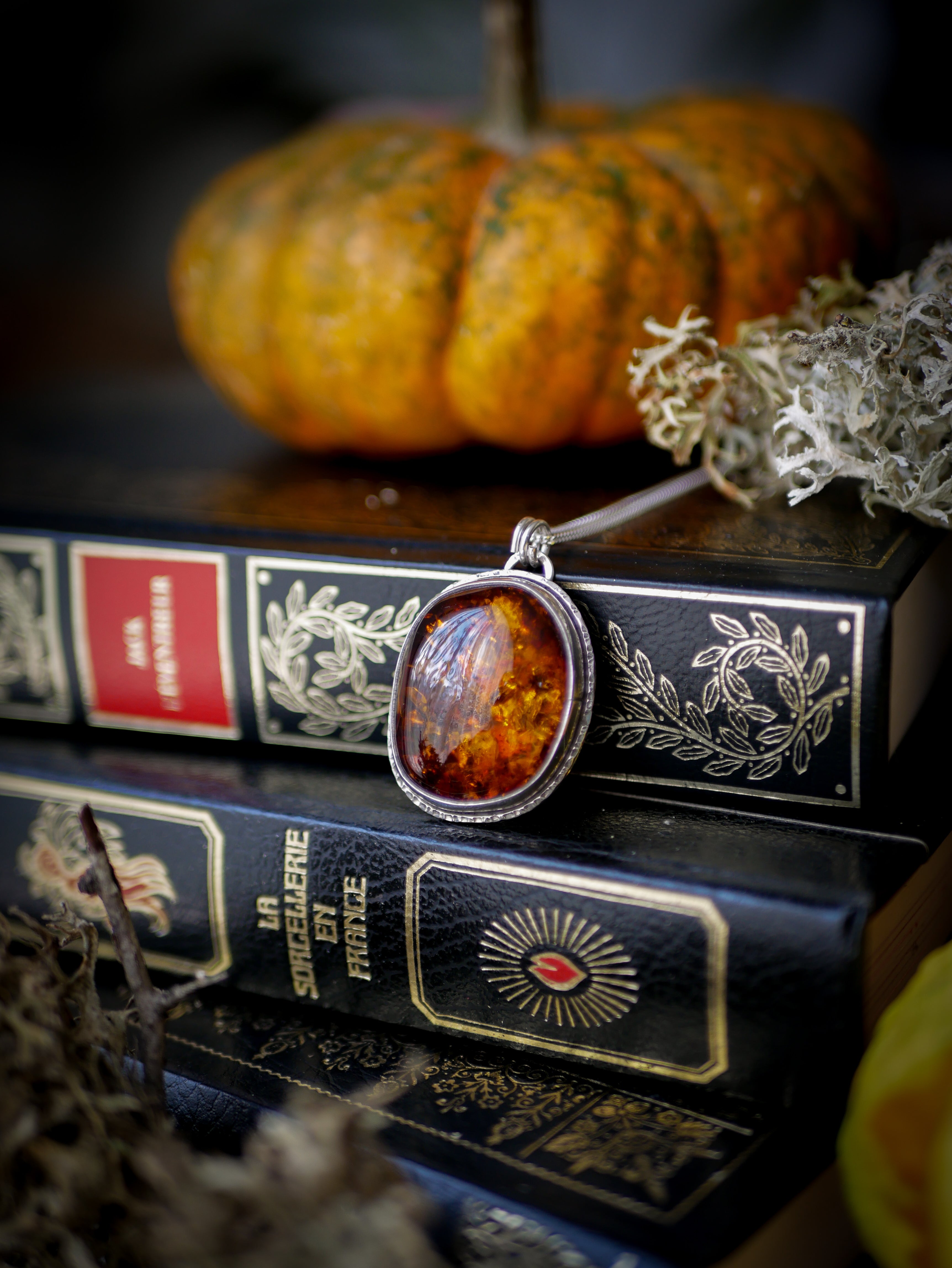 Jack O'Lantern - Baltic amber and silver necklace, Jack O'Lantern on the back
