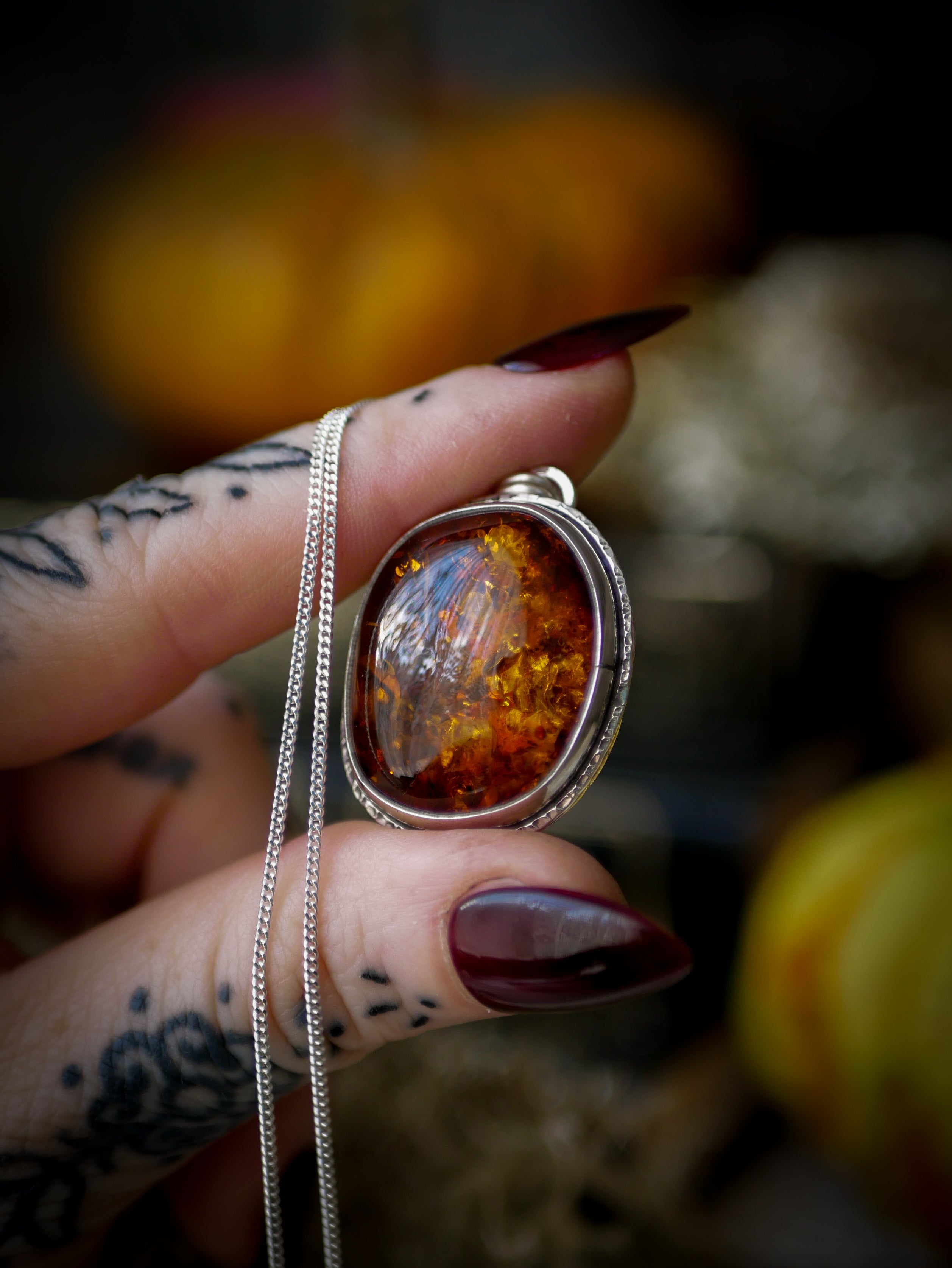 Jack O'Lantern - Baltic amber and silver necklace, Jack O'Lantern on the back
