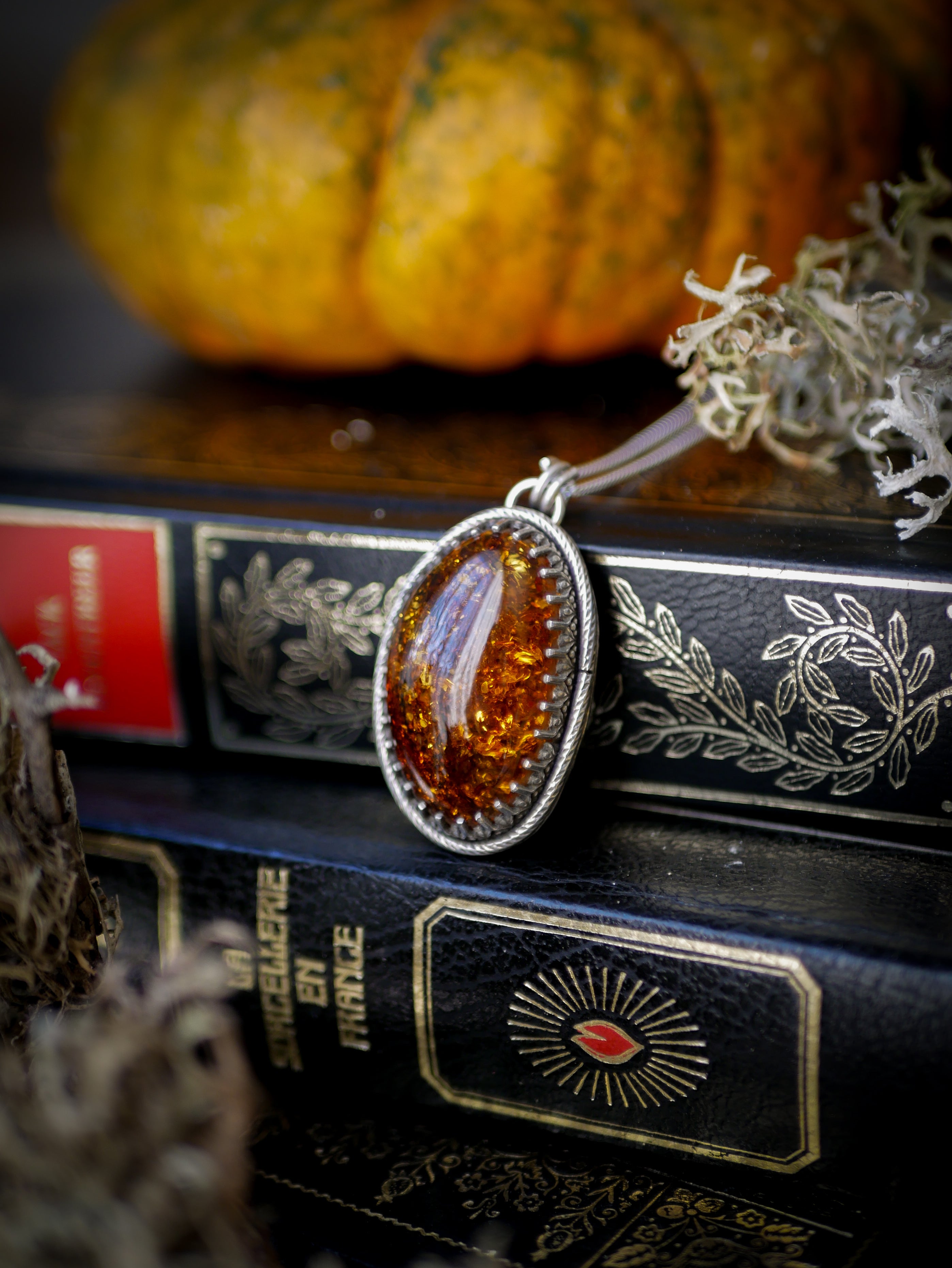 The Veil - Baltic amber and silver necklace, chrysanthemum on the back