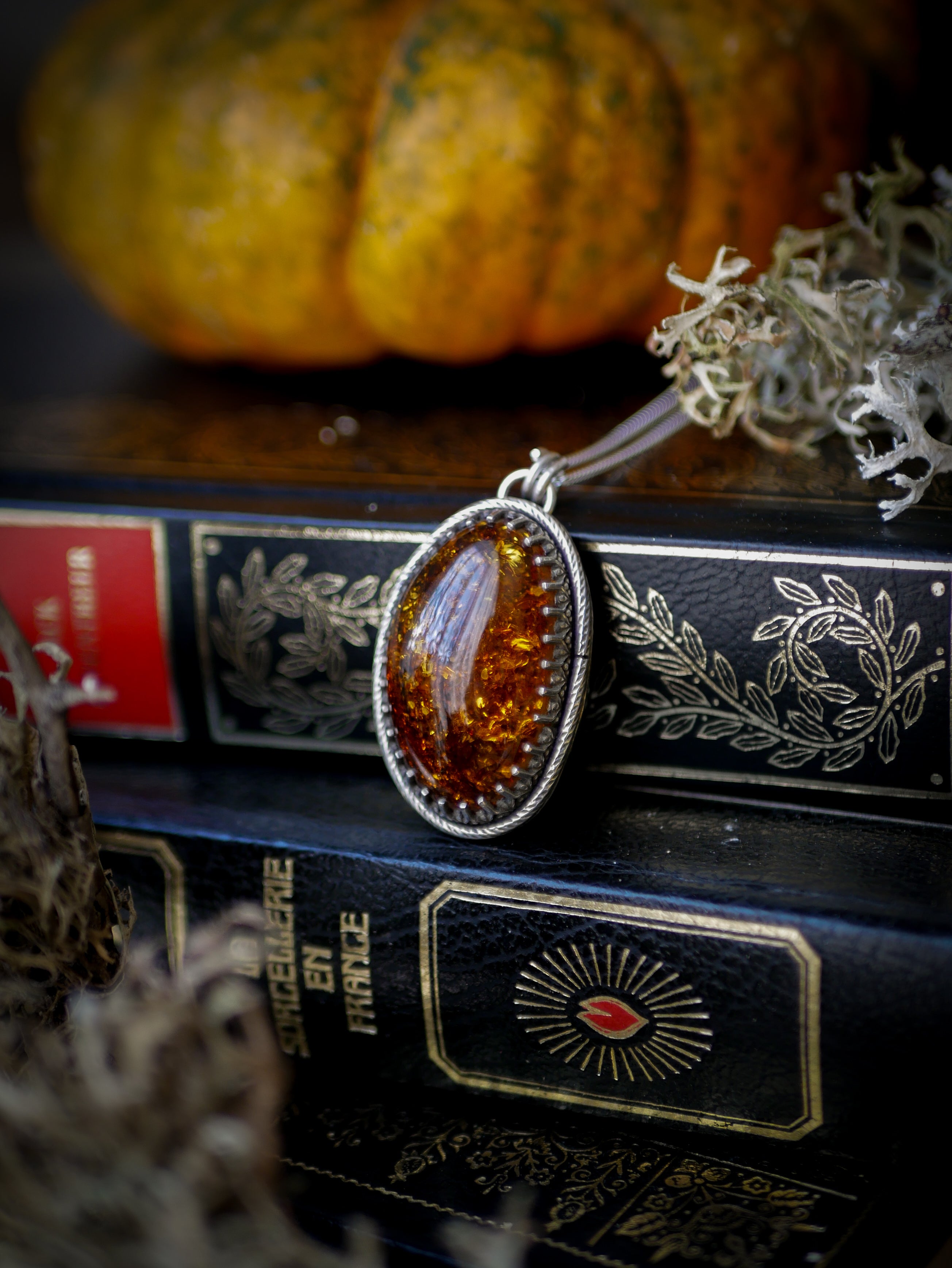 The Veil - Baltic amber and silver necklace, chrysanthemum on the back