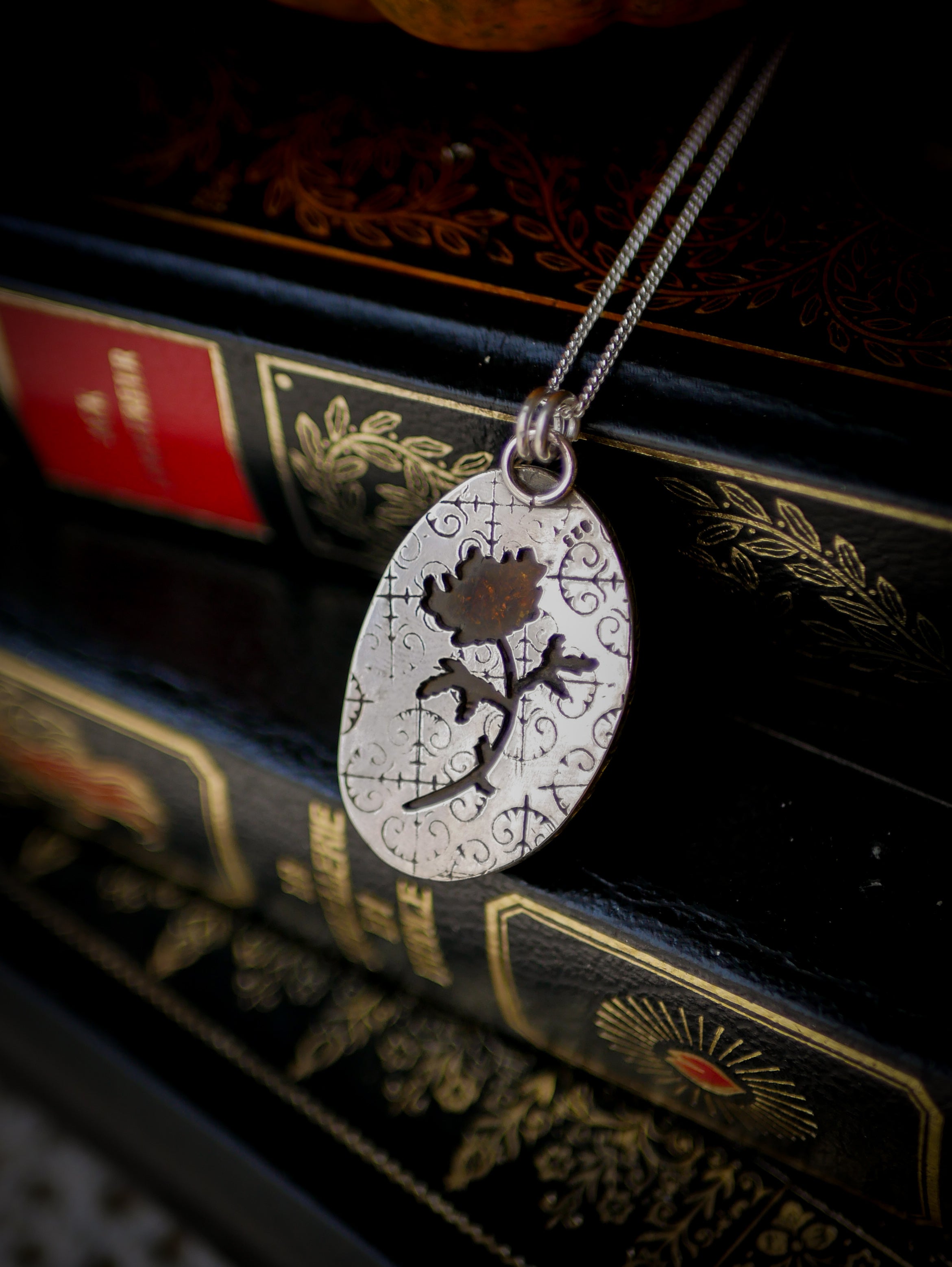 The Veil - Baltic amber and silver necklace, chrysanthemum on the back