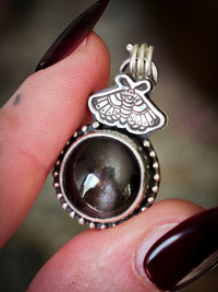 Divination - Scapolite and silver pendant, butterfly embossed