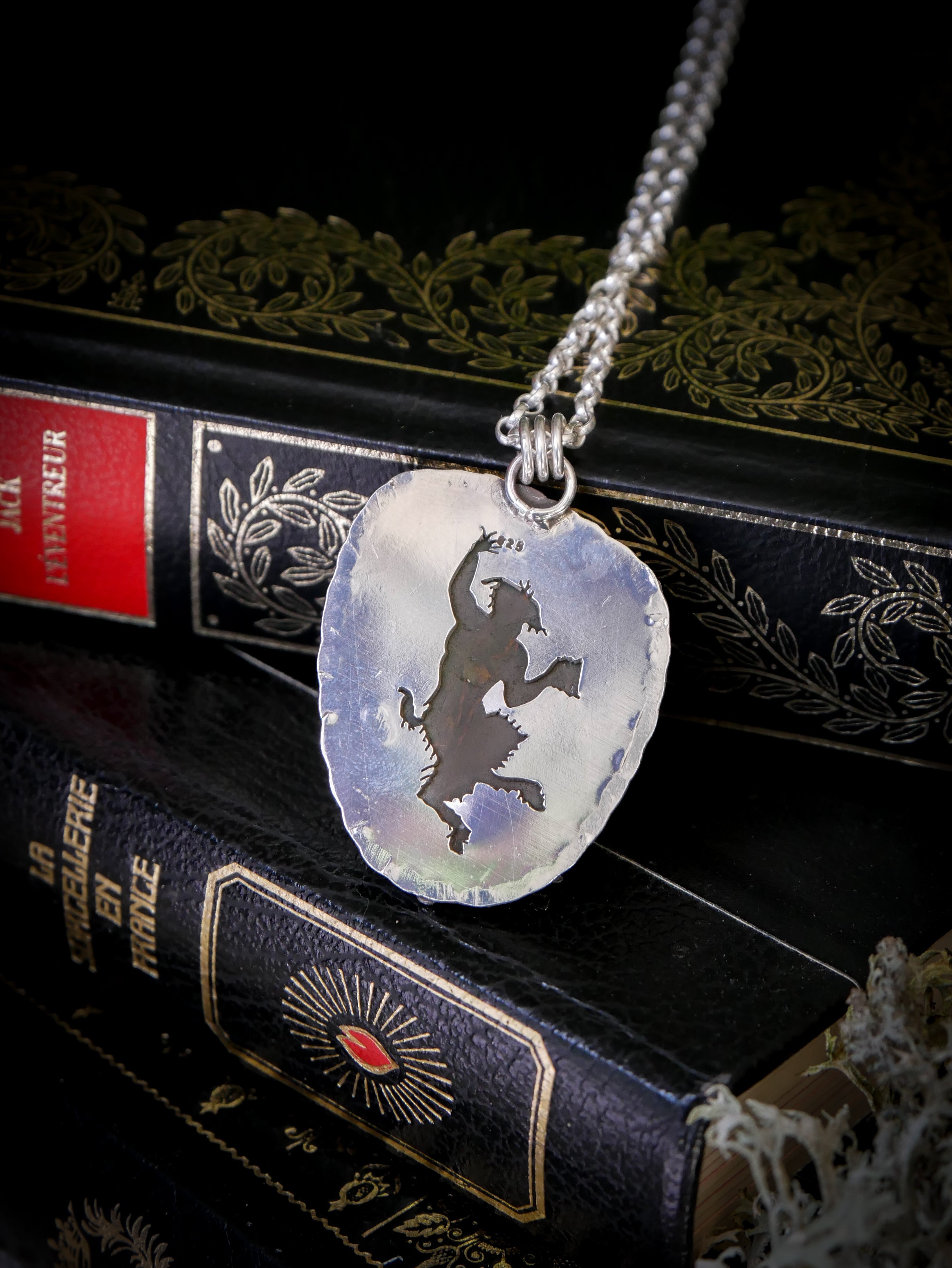 The Awakening of the Faun - Green opal and silver medallion, faun on the back