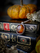 Jack O'Lantern - Baltic amber and silver necklace, Jack O'Lantern on the back