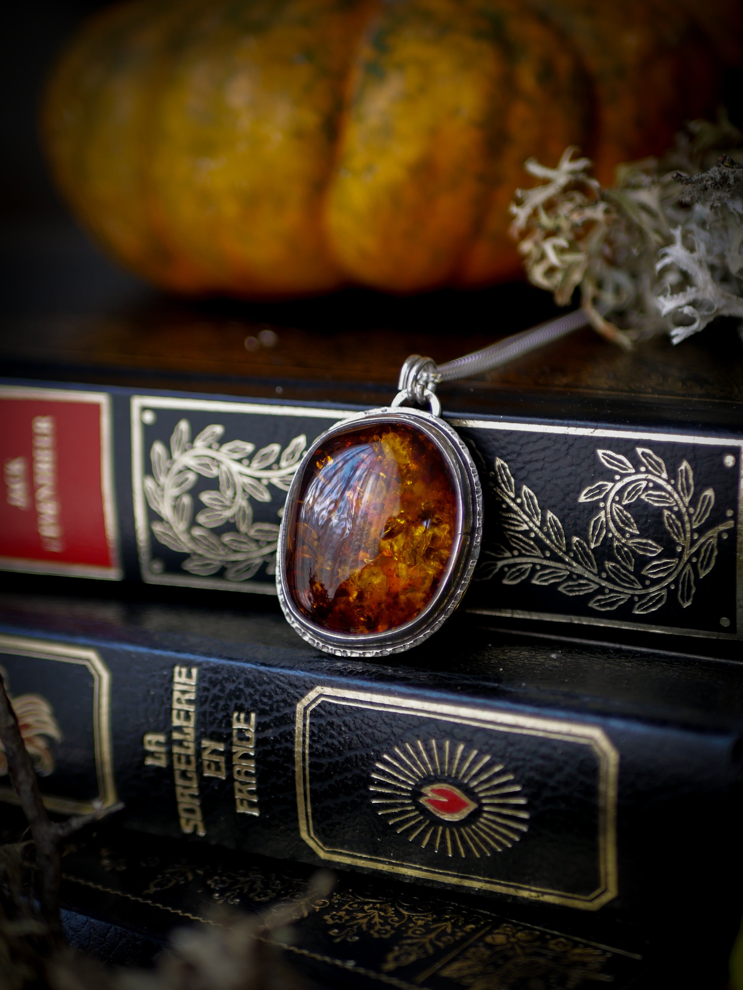 Jack O'Lantern - Baltic amber and silver necklace, Jack O'Lantern on the back