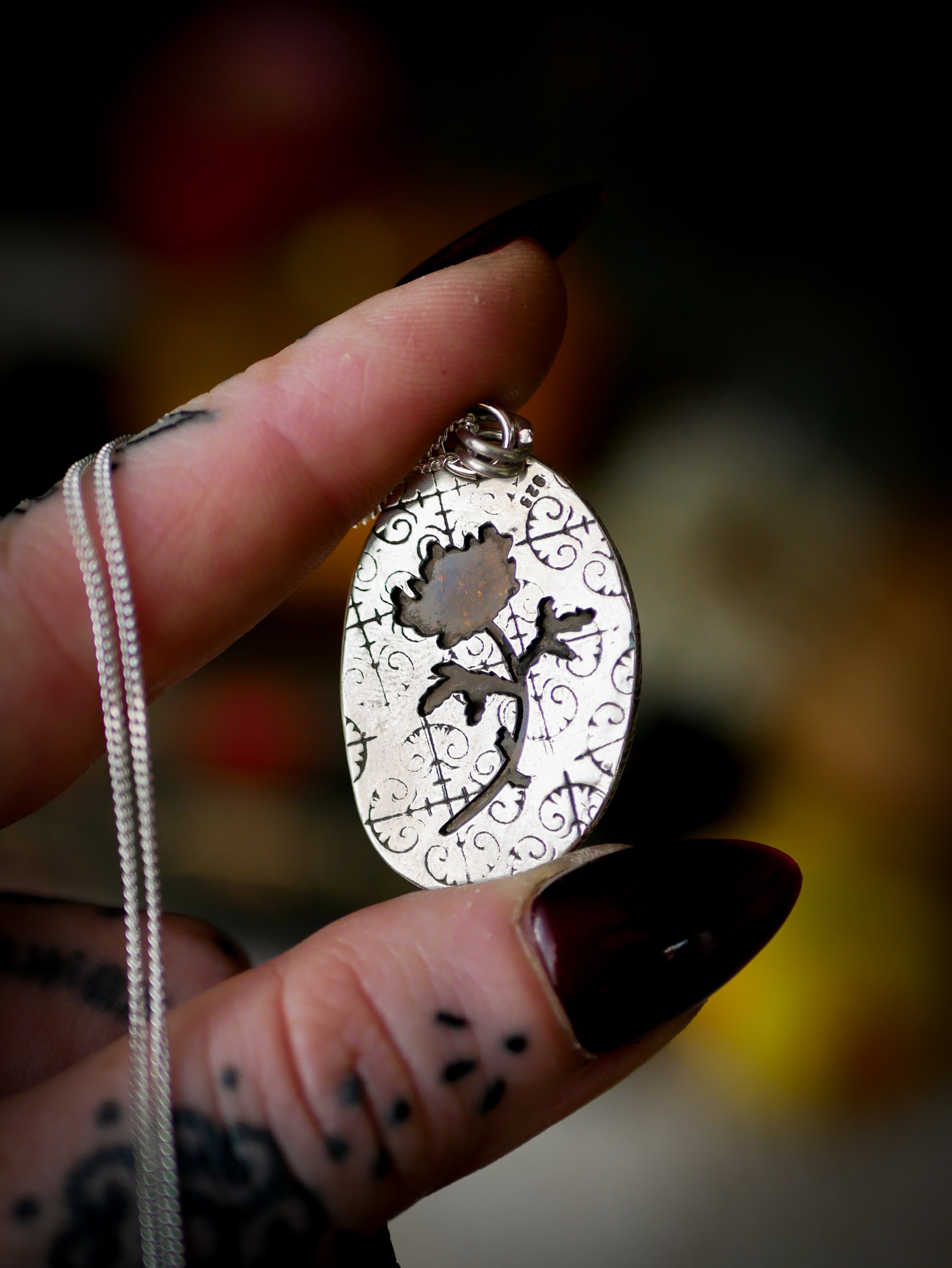 The Veil - Baltic amber and silver necklace, chrysanthemum on the back