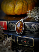 The Veil - Baltic amber and silver necklace, chrysanthemum on the back