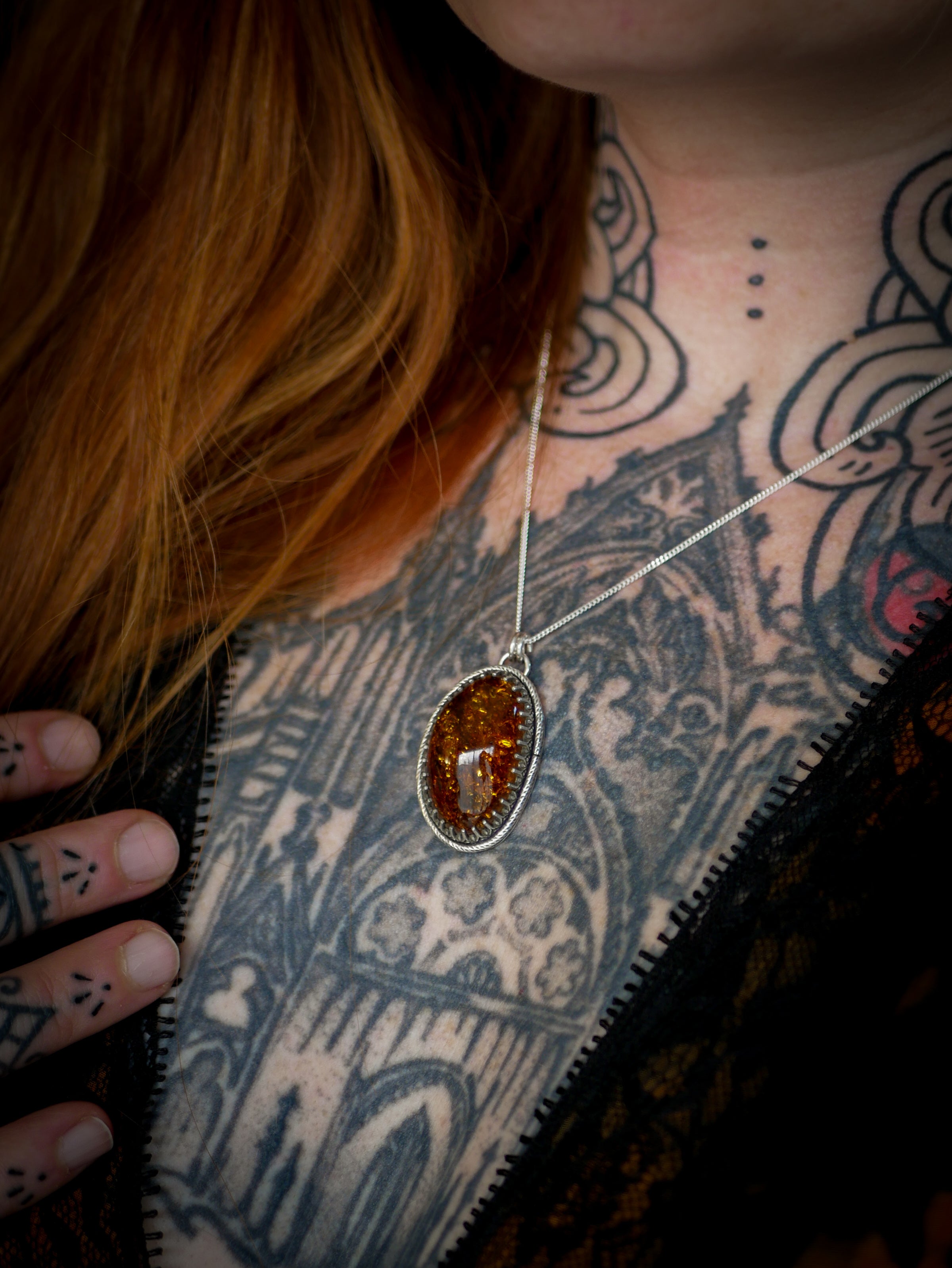 The Veil - Baltic amber and silver necklace, chrysanthemum on the back