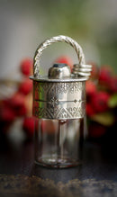 The Relic - Collana con fiala in argento, vetro e zaffiro grezzo